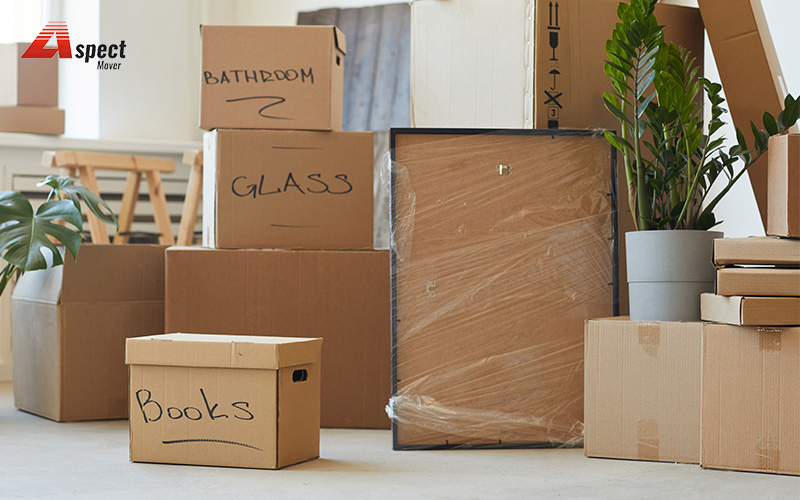 A stack of labelled boxes awaiting transportation